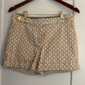 Cream and gold linen shorts with gold button detail